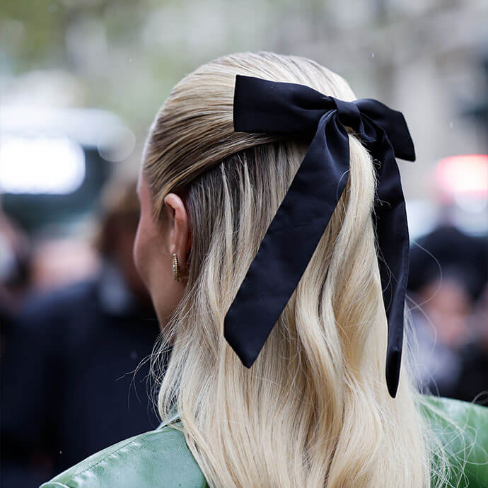 Shoulder Length Wavy Half Updo With Black Bow — Trendy Ribbon Hair