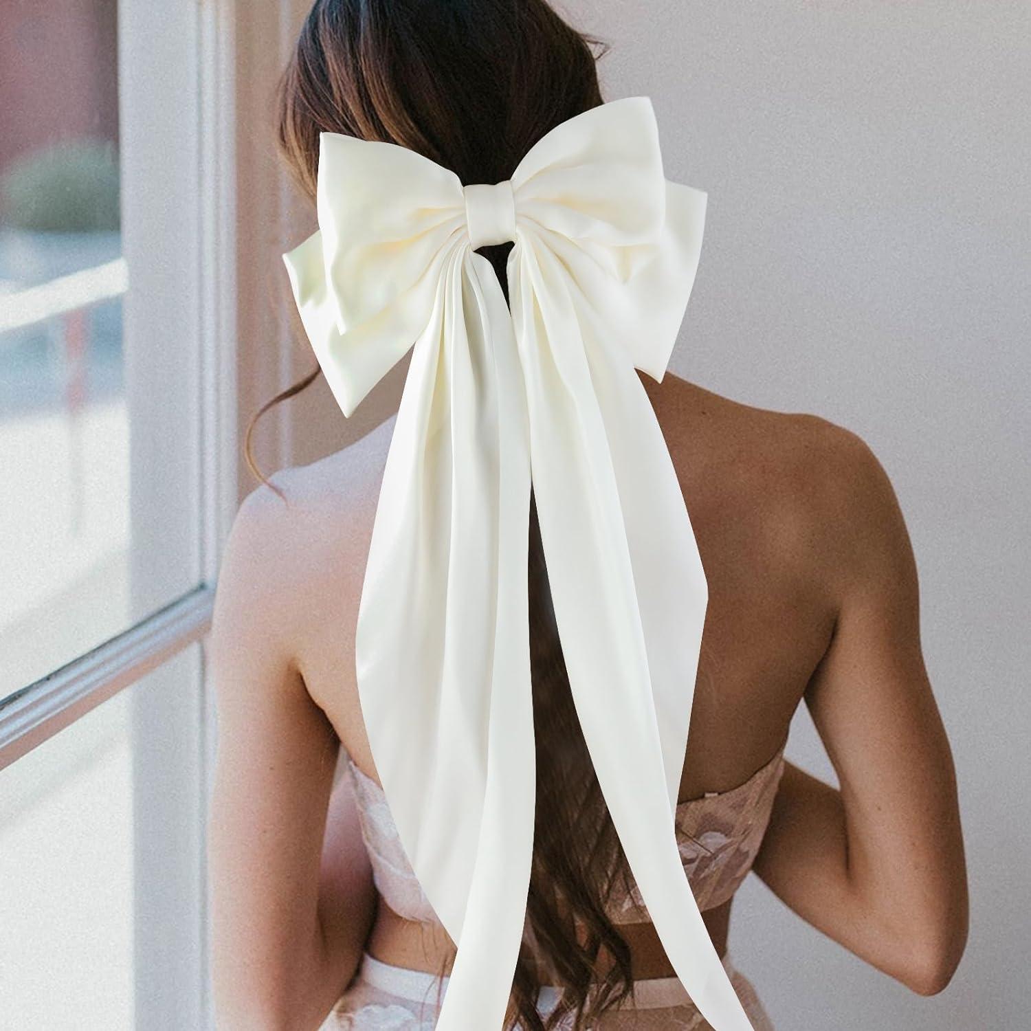 Mid-Back Loose Waves With Oversized White Bow — Trendy Ribbon Hair