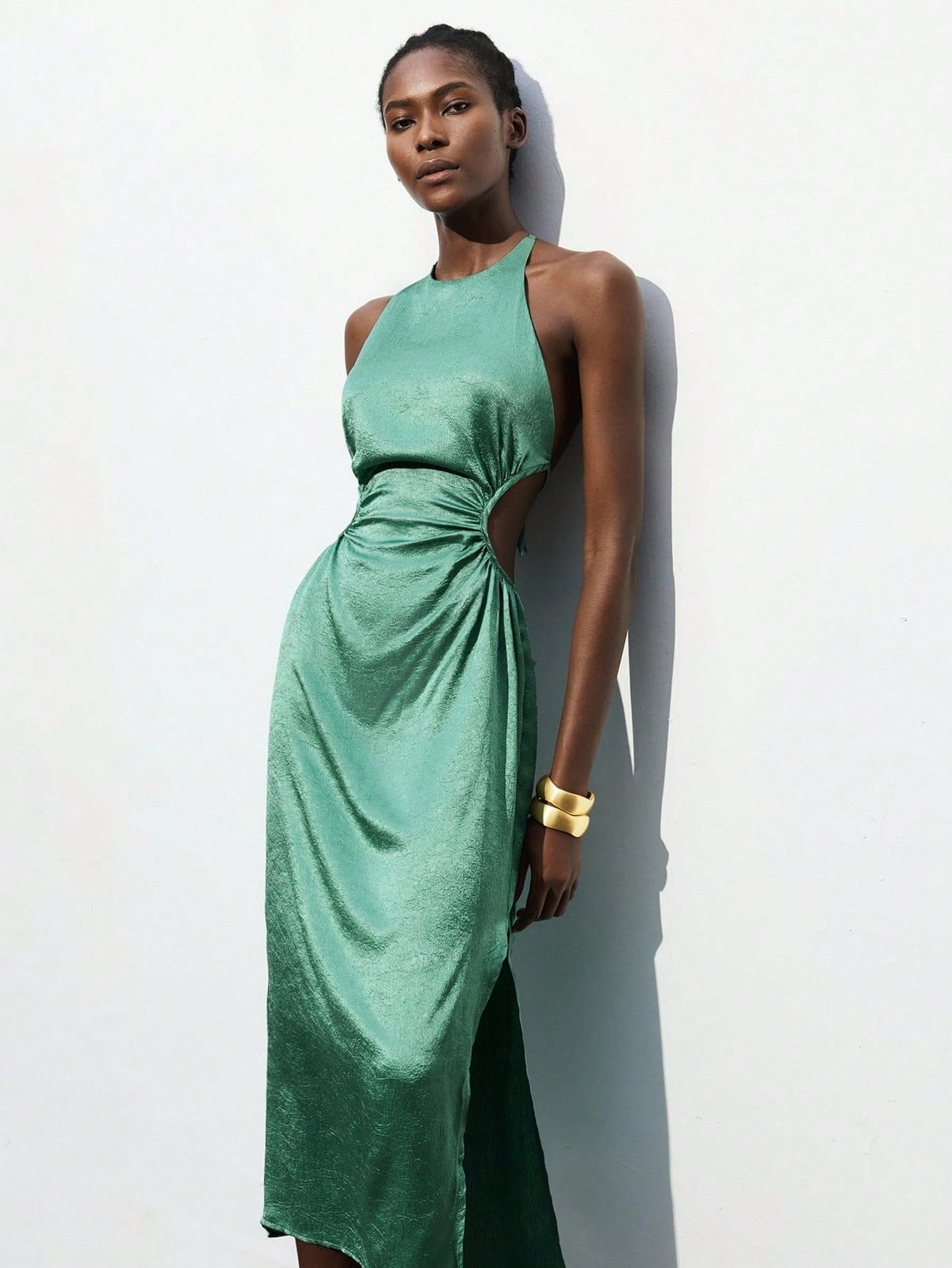Emerald Green Halter Neck Dress with Cut-Out and Gold Cuff Bracelet Emerald Green Halter Neck Dress with Cut-Out and Gold Cuff Bracelet — Trendy Sage Green Dress