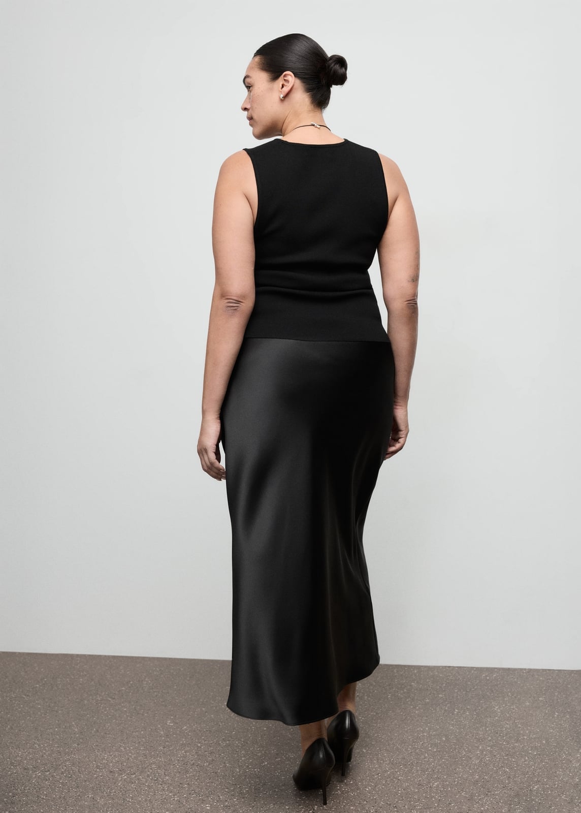 Black Satin Midi Skirt With Black Knit Top — Trendy Satin Skirt Outfits