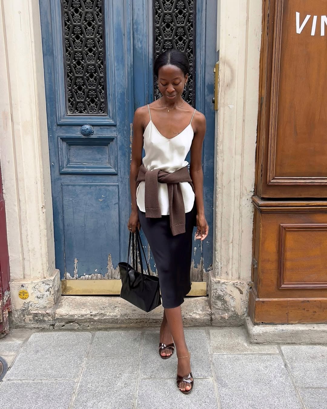 Navy Midi Skirt With White Camisole And Sweater Tie — Trendy Satin Skirt Outfits