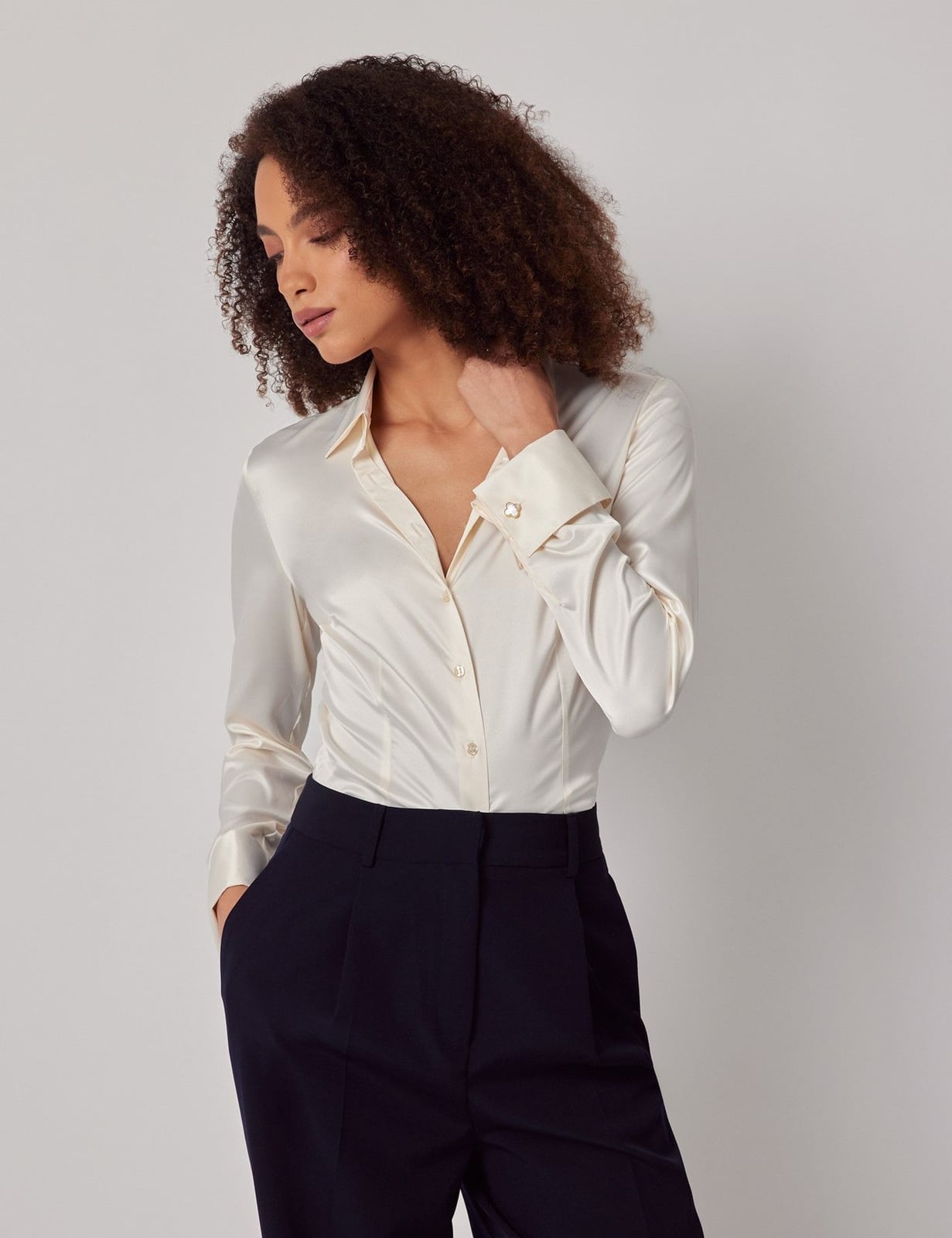 Cream Satin Shirt Tucked into Navy Trousers Cream Satin Shirt Tucked into Navy Trousers — Trendy Satin Top Outfits