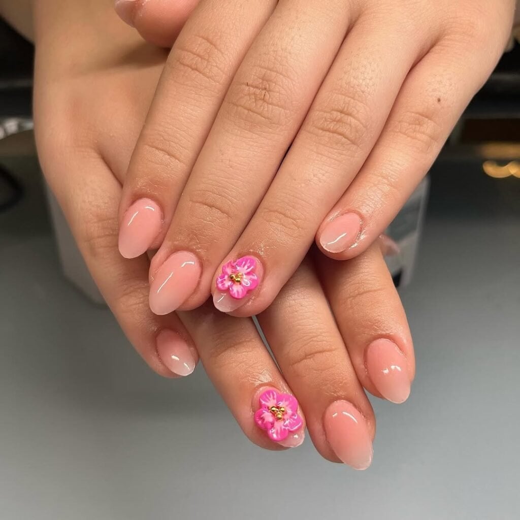Sheer Pink With 3D Pink Flowers Nails, Close-Up Take — Trendy Short Acrylic Nails