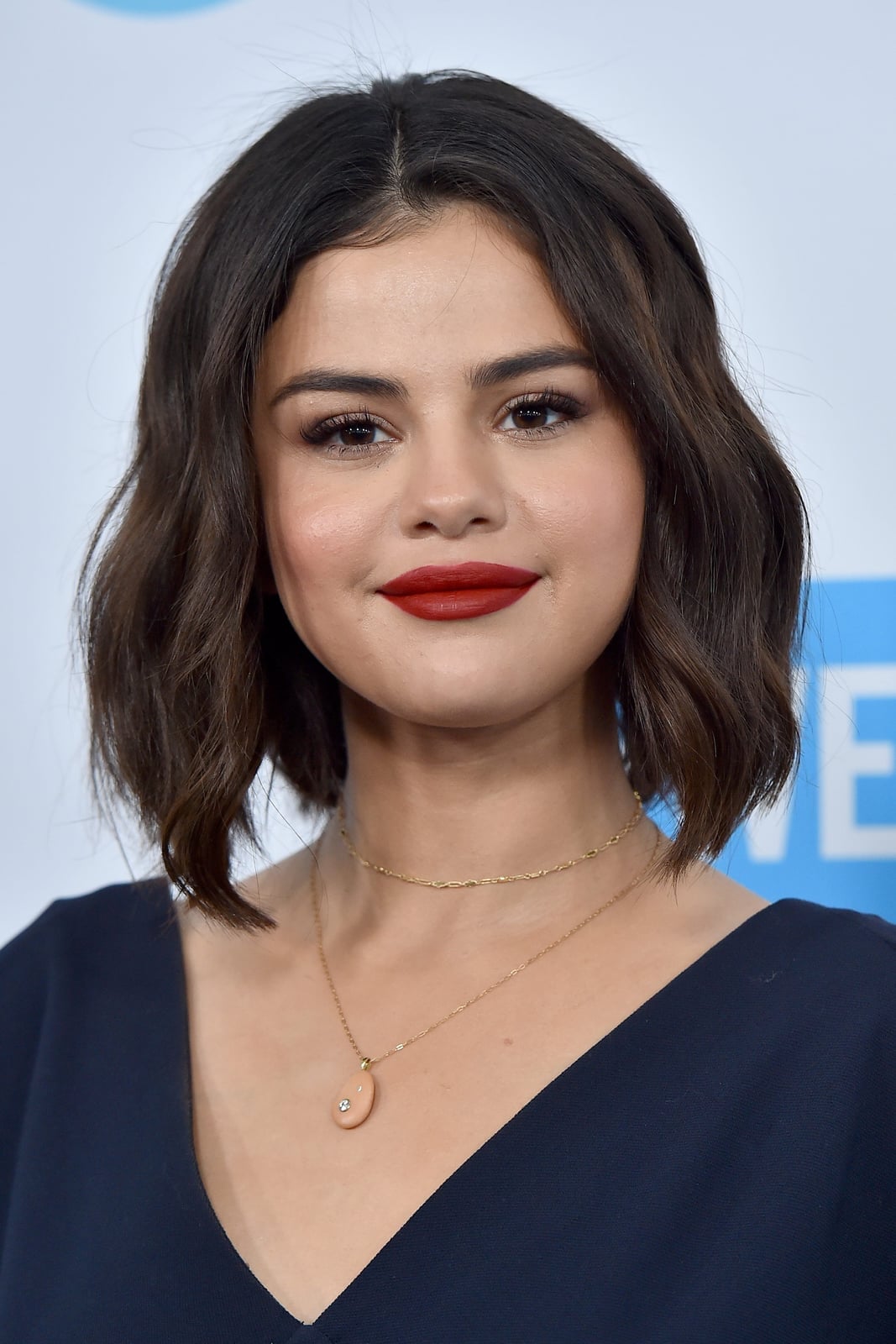 Short Bob With Side-Swept Bangs — Trendy Short Curly Hair