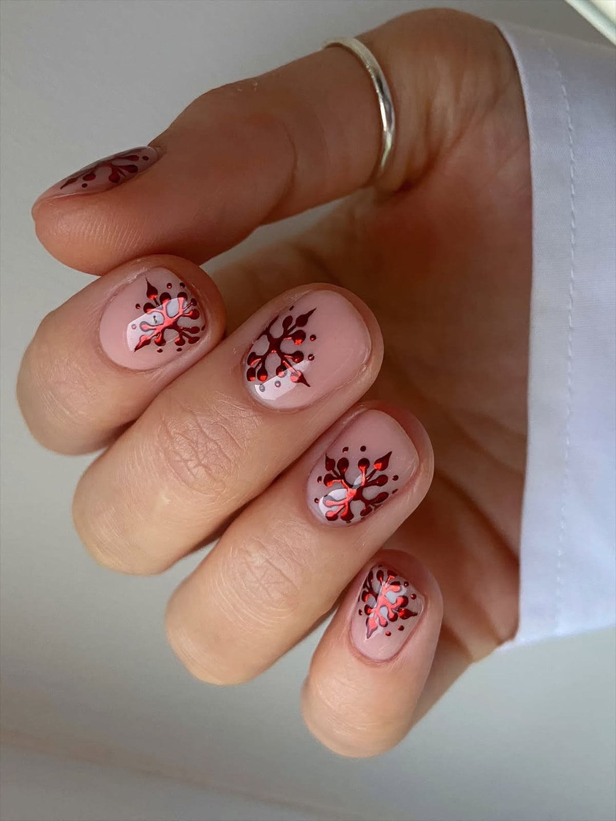 Red Snowflake Decal Sheer Nude Short Oval Nails — Trendy Short Gel Nails