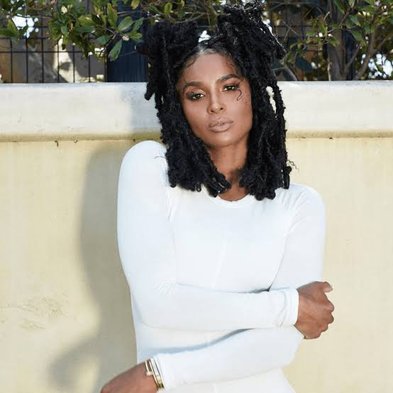 Shoulder Length Voluminous Black Locs Shoulder Length Voluminous Black Locs — Trendy Short Locs
