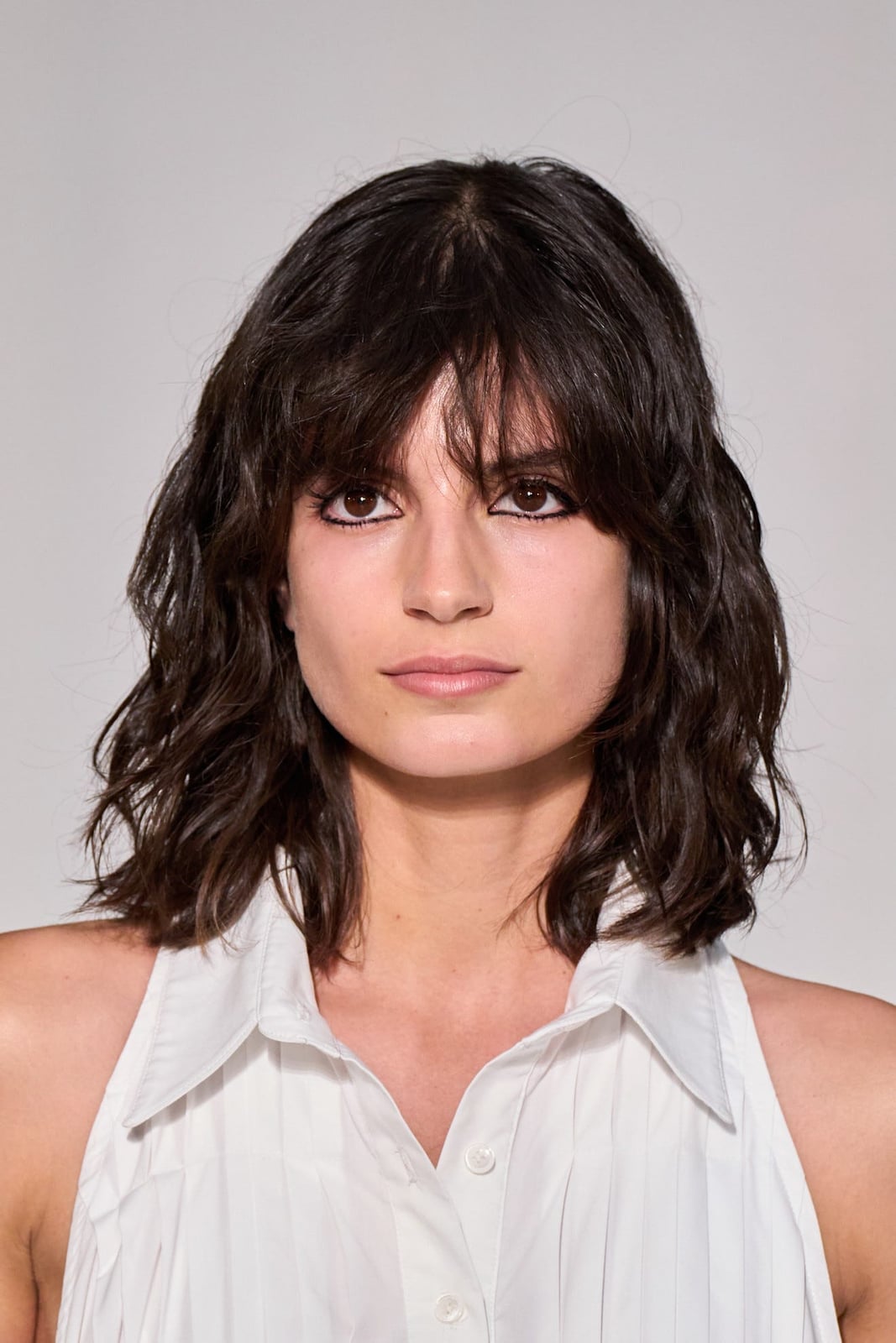 Dark Brown Wavy Shag With Curtain Bangs Dark Brown Wavy Shag With Curtain Bangs — Trendy Shoulder Length Bob