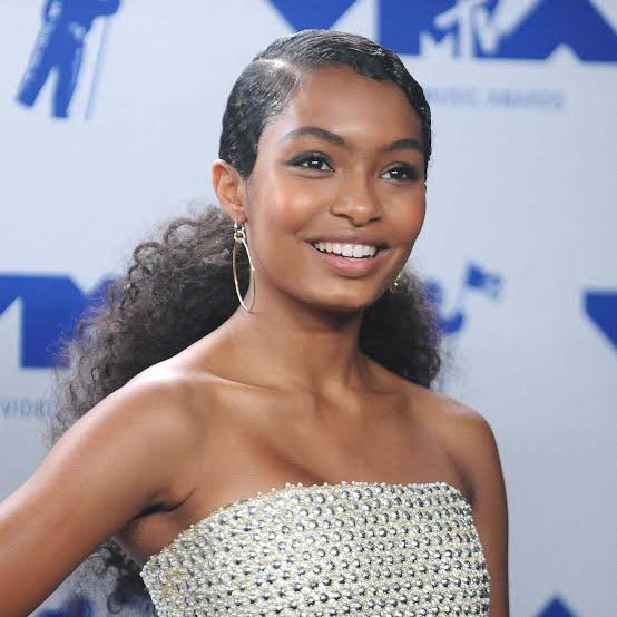Slicked Back Black Waves With Curtain Bangs — Trendy Slick Back Hairstyles
