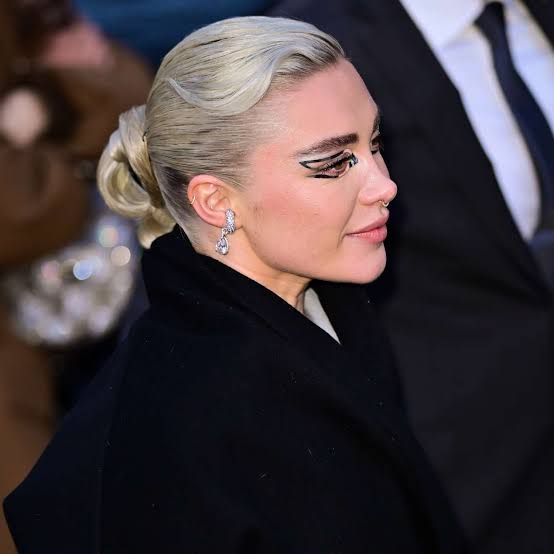 Platinum Blonde Low Bun With Waves — Trendy Slick Back Hairstyles
