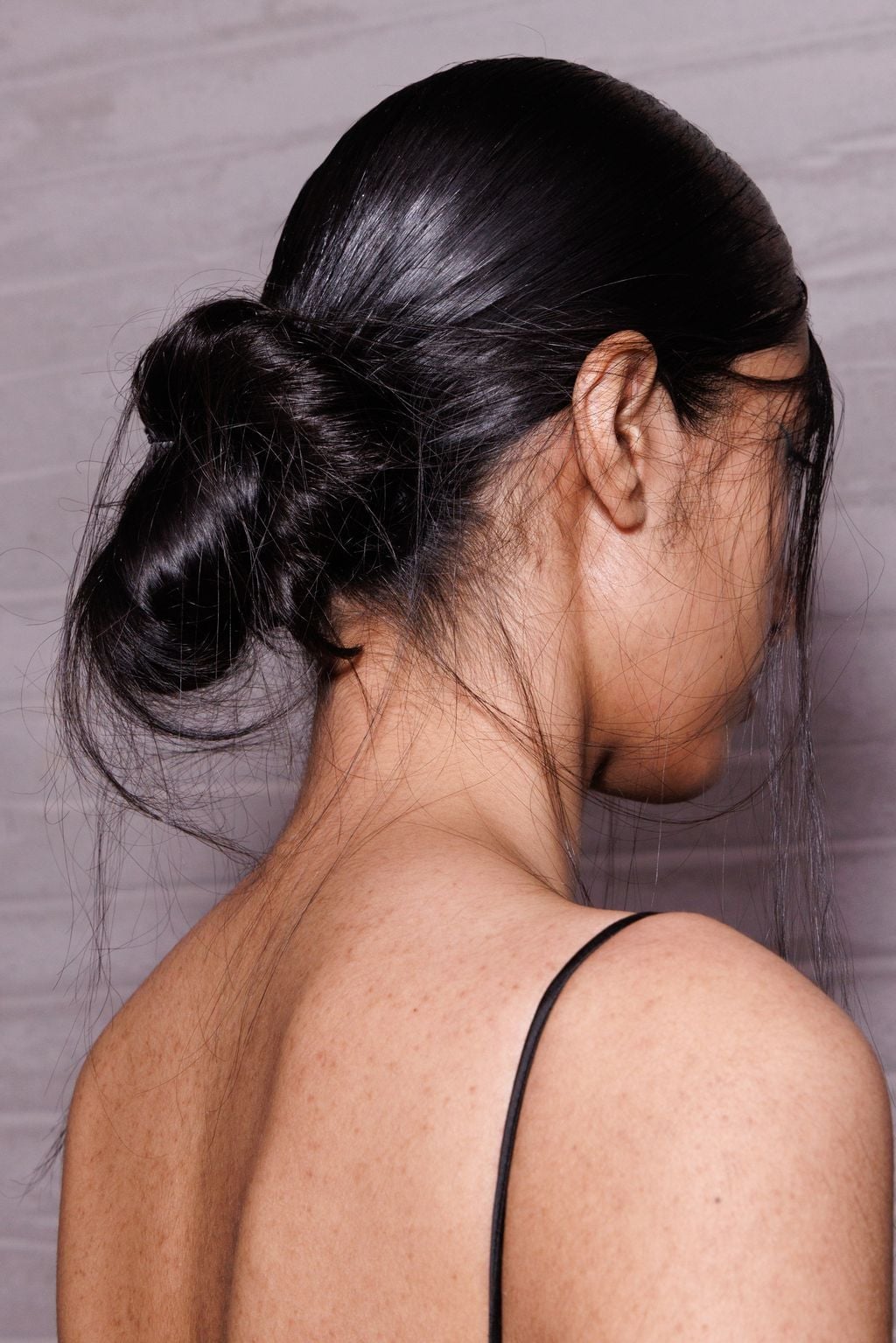 Dark Brown Sleek Bun Back View, Straight — Trendy Slick Back Hairstyles