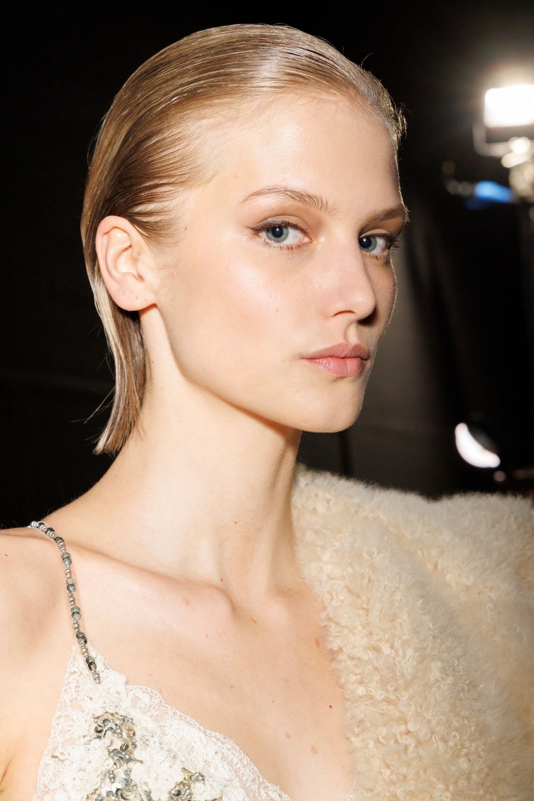 Glossy Blonde Slicked Back Bob — Trendy Slick Back Hairstyles