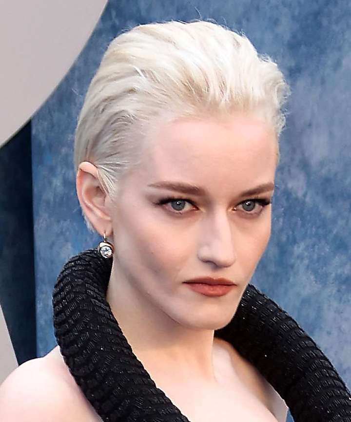 Platinum Blonde Textured Layered Cut — Trendy Slick Back Hairstyles
