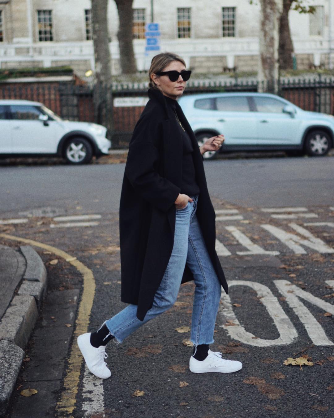 Black Crew Socks with White Sneakers and Blue Jeans — Trendy Socks Outfits