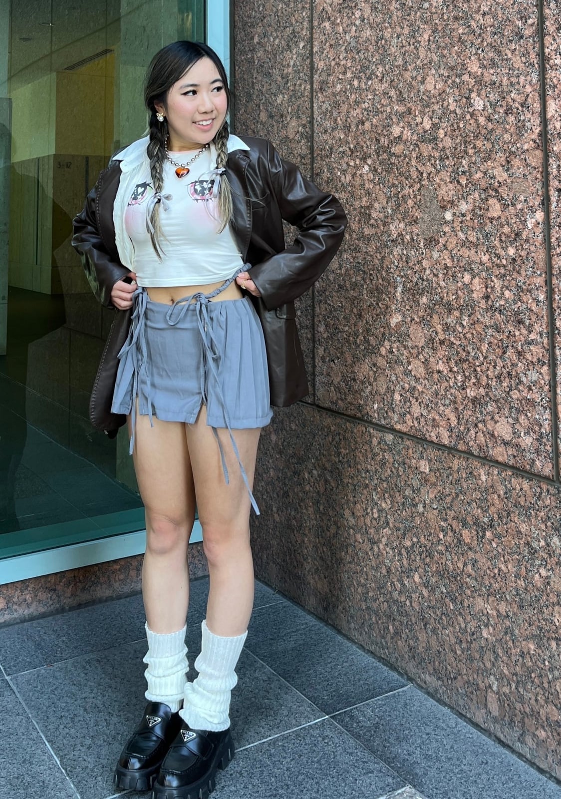 Leather Blazer Over a Graphic Crop Top and Mini Skirt Leather Blazer Over a Graphic Crop Top and Mini Skirt — Trendy Sorority Outfits