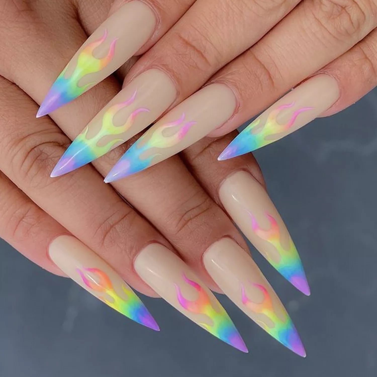 Nude Stilettos With Rainbow Flame Gradient Tips Nude Stilettos With Rainbow Flame Gradient Tips — Trendy Stiletto Nails