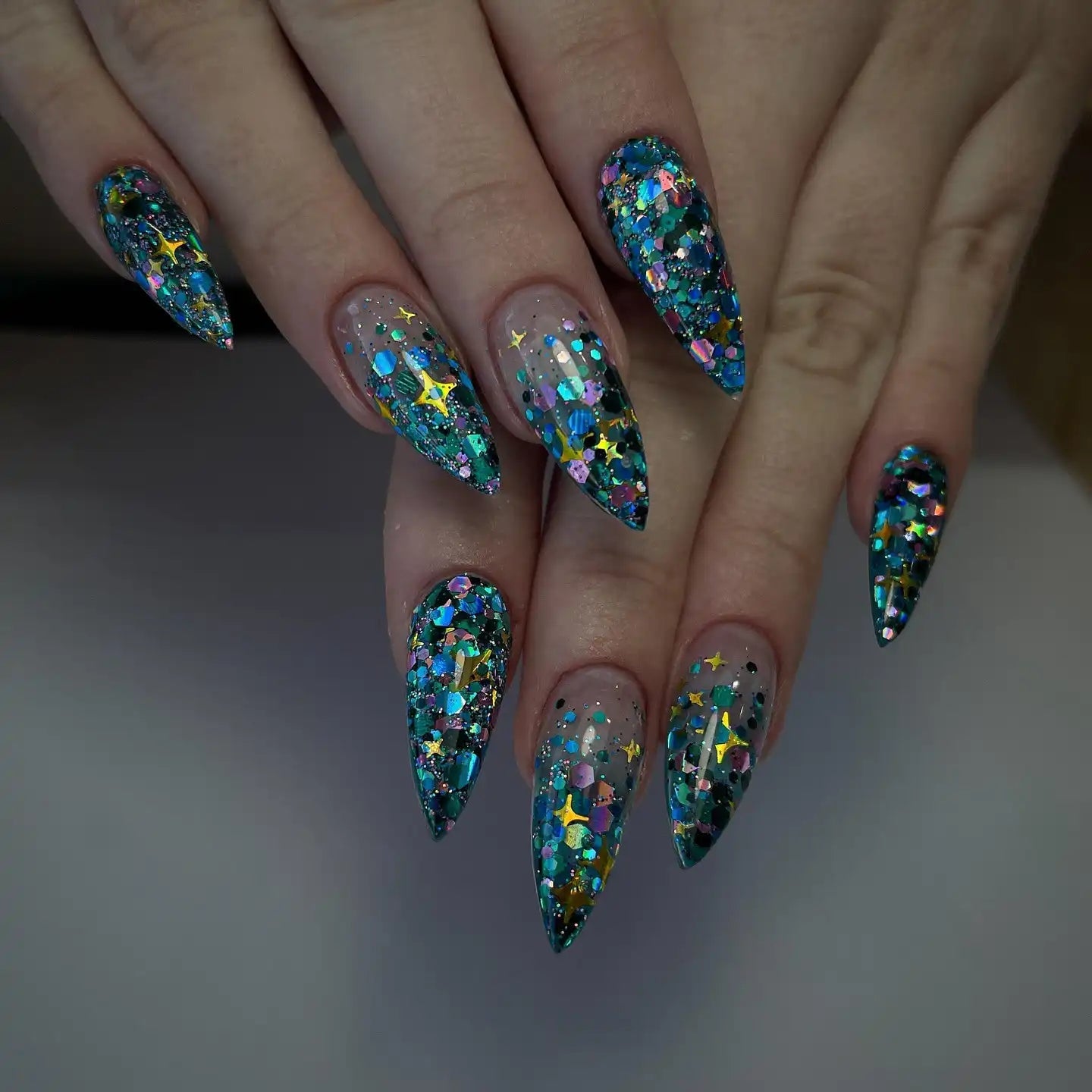 Glitter Bomb Stilettos With Star Accents Glitter Bomb Stilettos With Star Accents — Trendy Stiletto Nails