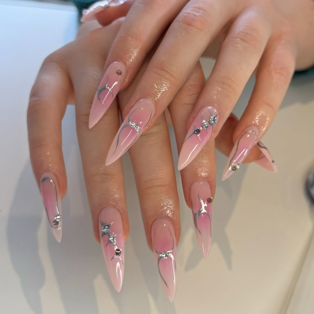 Sheer Pink Stilettos With Silver Accents Sheer Pink Stilettos With Silver Accents — Trendy Stiletto Nails