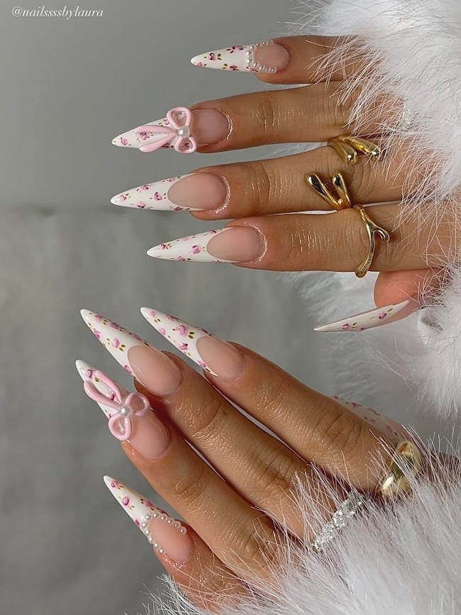Sheer Nude Stilettos With Floral French Tips and 3D Bows Sheer Nude Stilettos With Floral French Tips and 3D Bows — Trendy Stiletto Nails