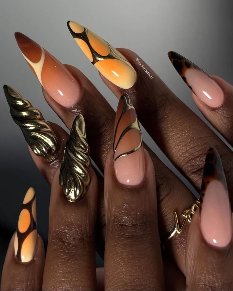 Nude Stilettos With Butterfly Wings and Gold, Close-Up Take Nude Stilettos With Butterfly Wings and Gold, Close-Up Take — Trendy Stiletto Nails