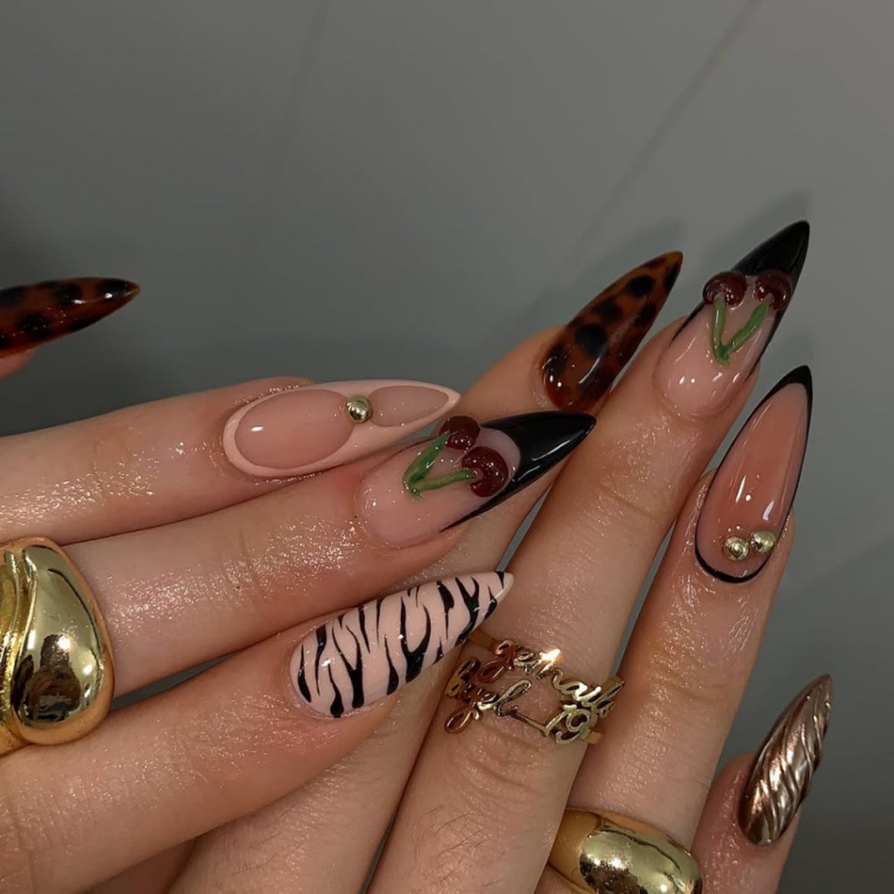 Stiletto Nails With Animal Prints and Cherry Charms Stiletto Nails With Animal Prints and Cherry Charms — Trendy Stiletto Nails