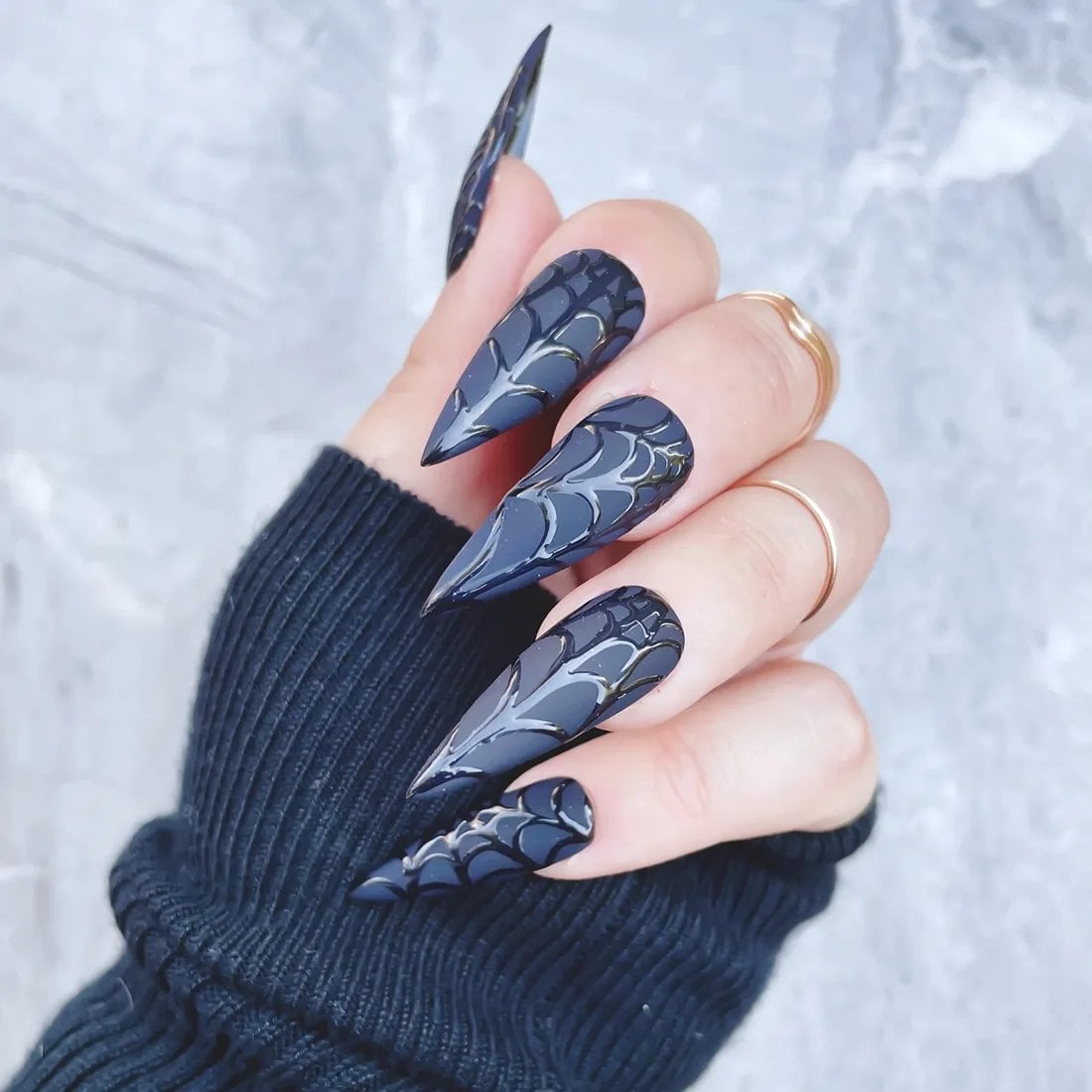 Vibrant Red Stilettos With Black Spider Webs Vibrant Red Stilettos With Black Spider Webs — Trendy Stiletto Nails