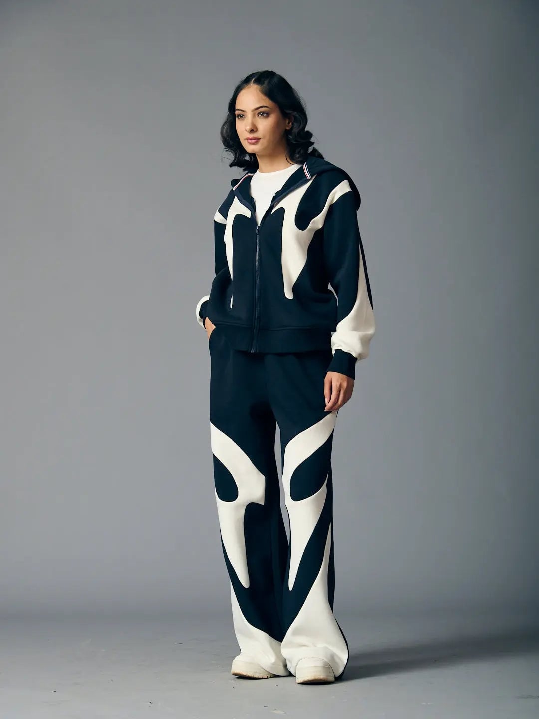 Abstract Graphic Tracksuit with White Shoes Abstract Graphic Tracksuit with White Shoes — Trendy Streetwear Outfits