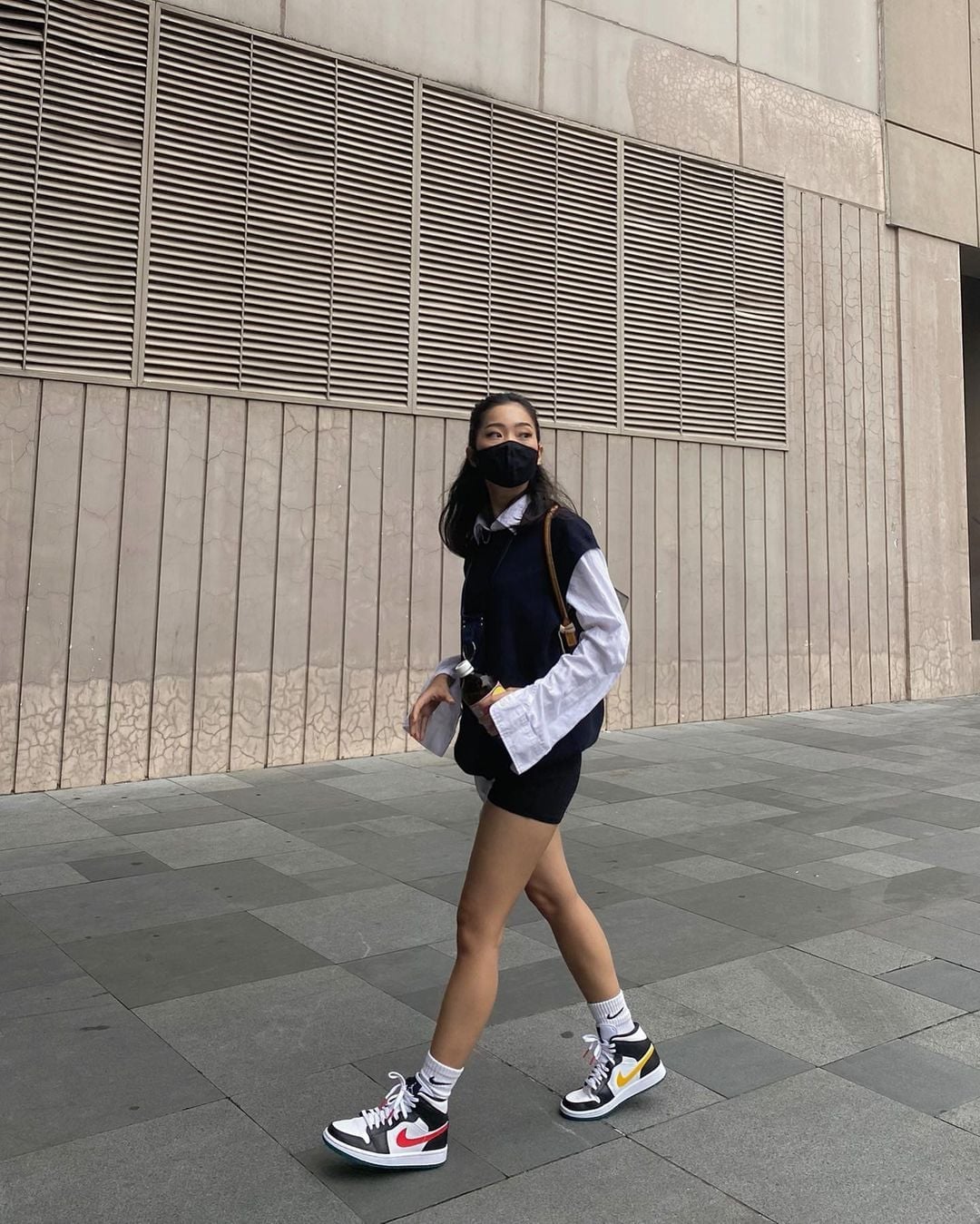 Navy Vest Layered Over White Shirt and Black Shorts Navy Vest Layered Over White Shirt and Black Shorts — Trendy Streetwear Outfits
