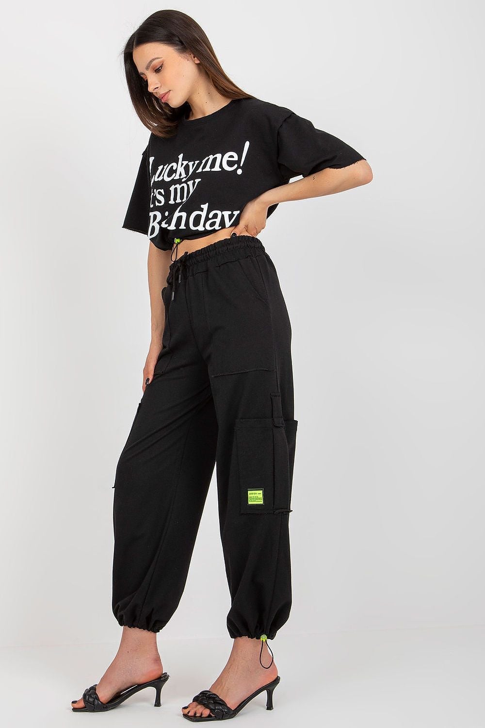 Cropped Graphic T-Shirt with Neon Detail Cargo Pants, Close-Up Take Cropped Graphic T-Shirt with Neon Detail Cargo Pants, Close-Up Take — Trendy Streetwear Outfits