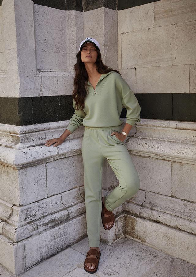 Green Knit Sweatpants Set with Quarter-Zip and Sandals — Trendy Sweatpants Outfits