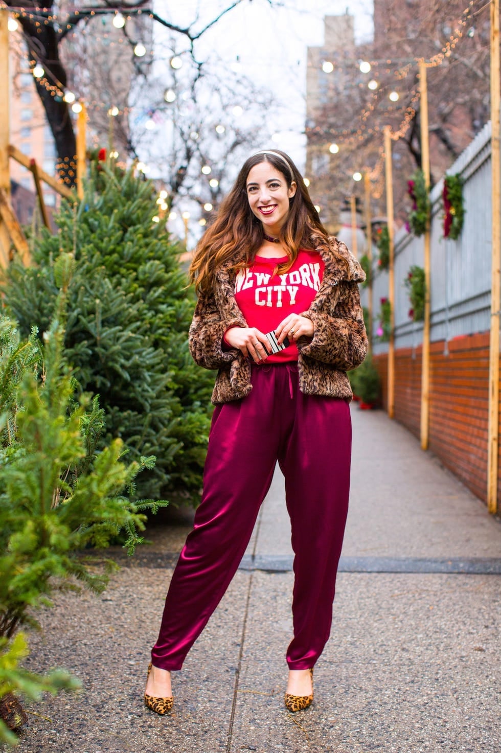 Burgundy Satin Sweatpants with Graphic Tee and Leopard, Close-Up Take — Trendy Sweatpants Outfits