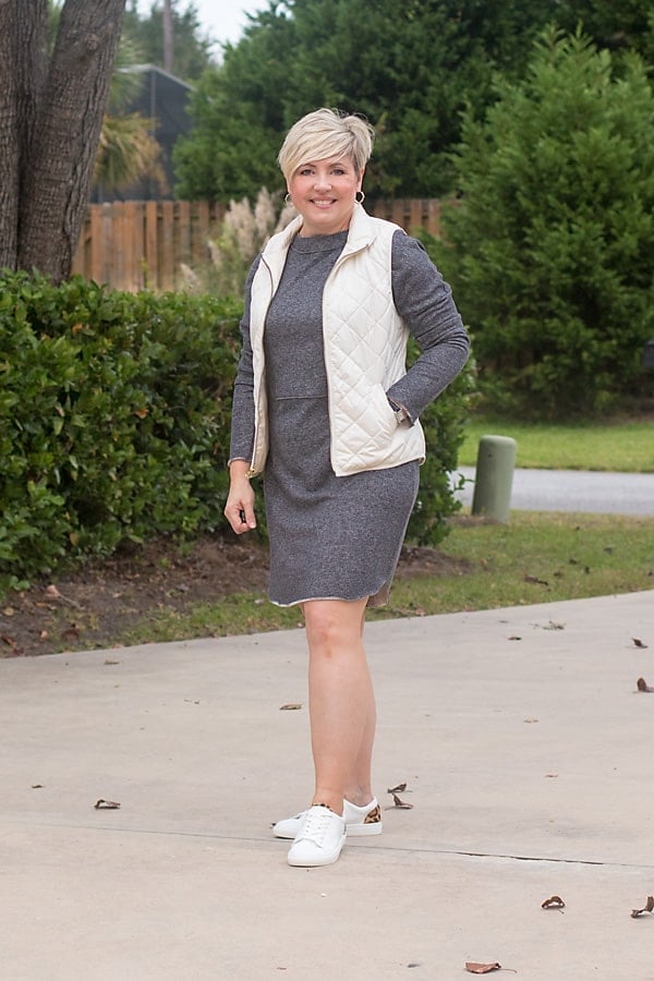 Grey Knit Dress with Cream Quilted Vest and Sneakers — Trendy Sweatshirt Outfits Women