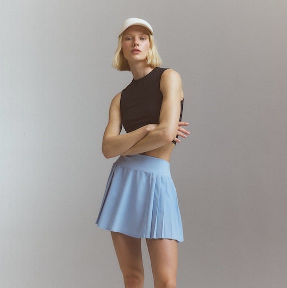 Light Blue Pleated Skirt With Crop Top And Cap Light Blue Pleated Skirt With Crop Top And Cap — Trendy Tennis Skirt Outfits