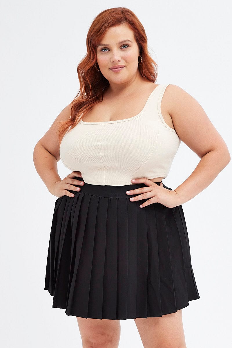 Black Pleated Tennis Skirt With Ribbed Tank Top Black Pleated Tennis Skirt With Ribbed Tank Top — Trendy Tennis Skirt Outfits