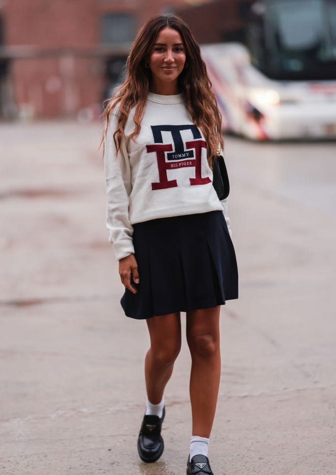 Navy Pleated Tennis Skirt With Logo Sweater Navy Pleated Tennis Skirt With Logo Sweater — Trendy Tennis Skirt Outfits