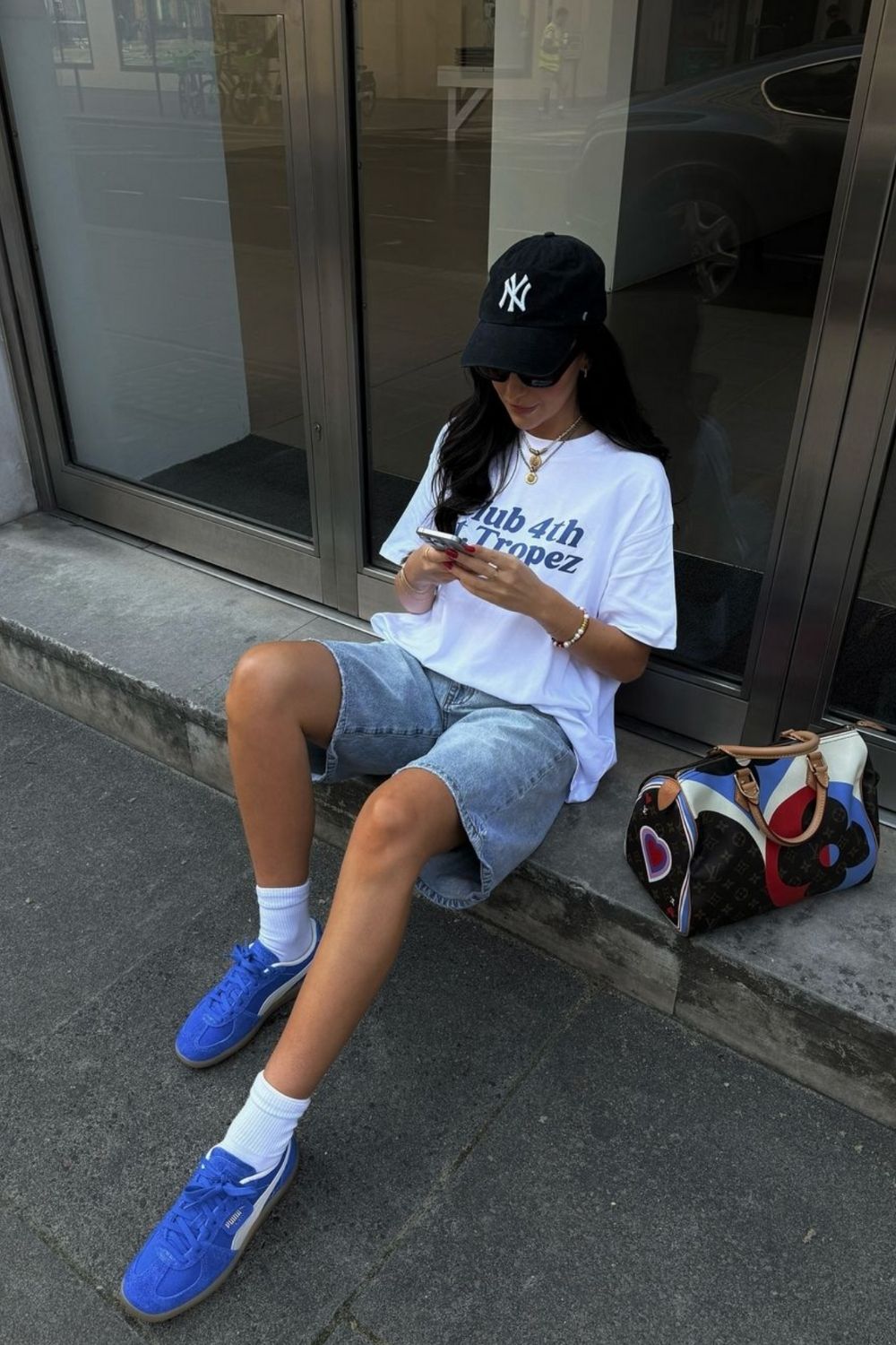 Graphic T Shirt With Baggy Denim Shorts And Baseball Cap — Trendy Tomboy Outfits