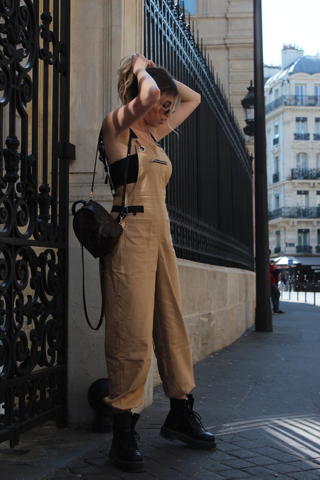 Tan Utility Jumpsuit With Combat Boots And Backpack — Trendy Tomboy Outfits