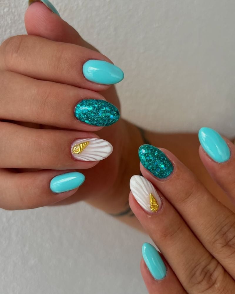 Turquoise Glitter With 3D Shell Oval Nails Turquoise Glitter With 3D Shell Oval Nails — Trendy Turquoise Nails