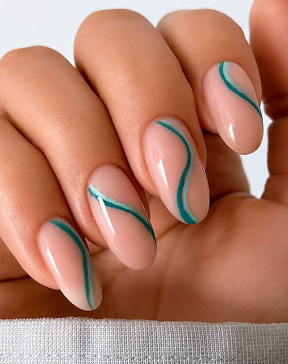 Nude Base With Wavy Turquoise Mint Lines Almond Nails Nude Base With Wavy Turquoise Mint Lines Almond Nails — Trendy Turquoise Nails