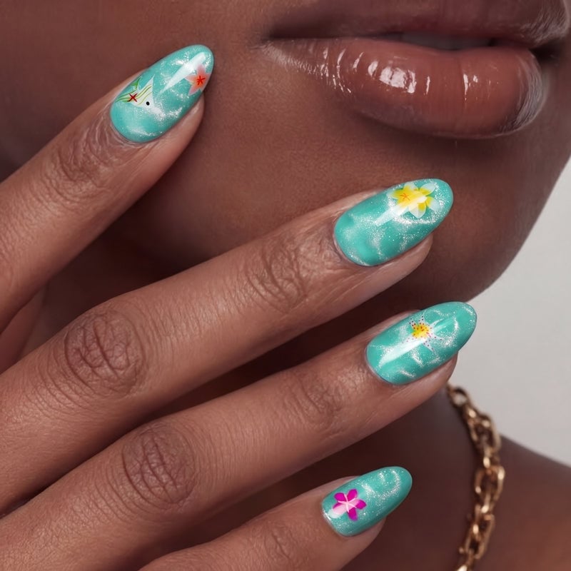 Shimmering Turquoise With Floral Stickers Oval Nails Shimmering Turquoise With Floral Stickers Oval Nails — Trendy Turquoise Nails