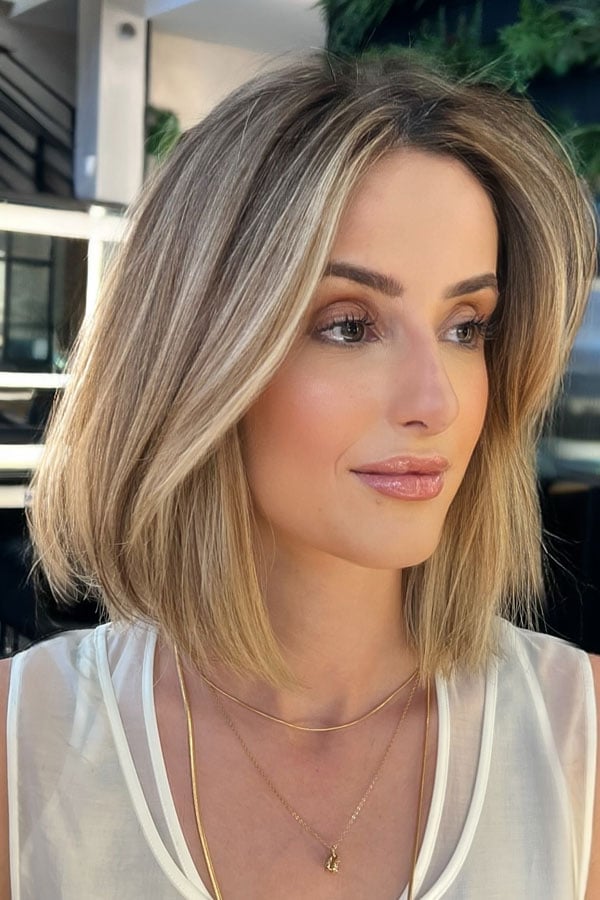 Blonde Bob With Curtain Bangs And Face-Framing Layers — Trendy Twist Bob