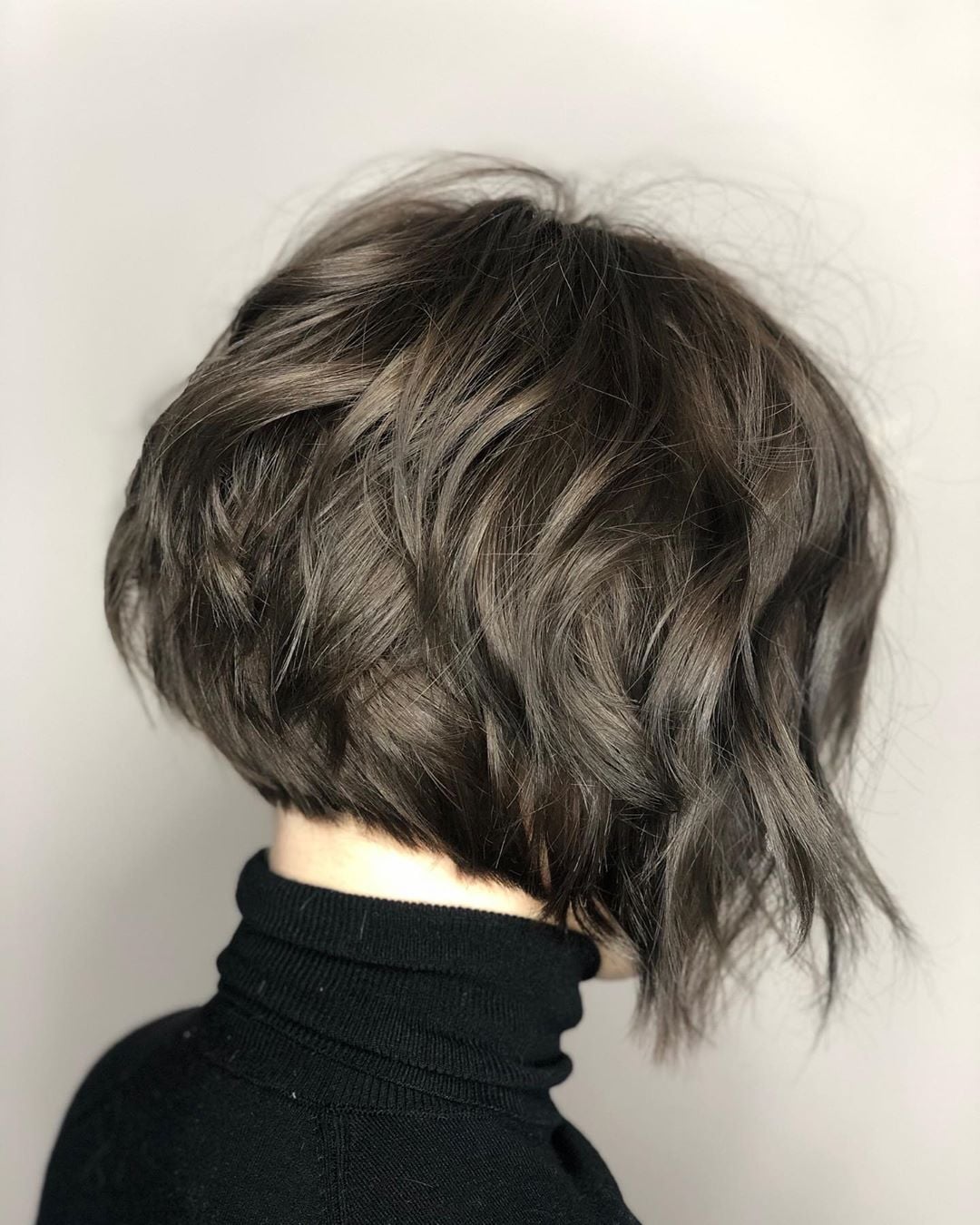Dark Brown Bob With Subtle Highlights — Trendy Twist Bob