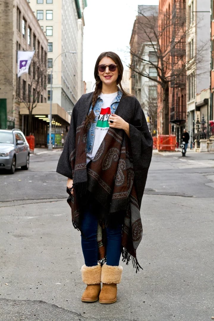 Ugg Boots with Poncho and Denim Jacket and A Graphic T-Shirt — Trendy Uggs Outfits