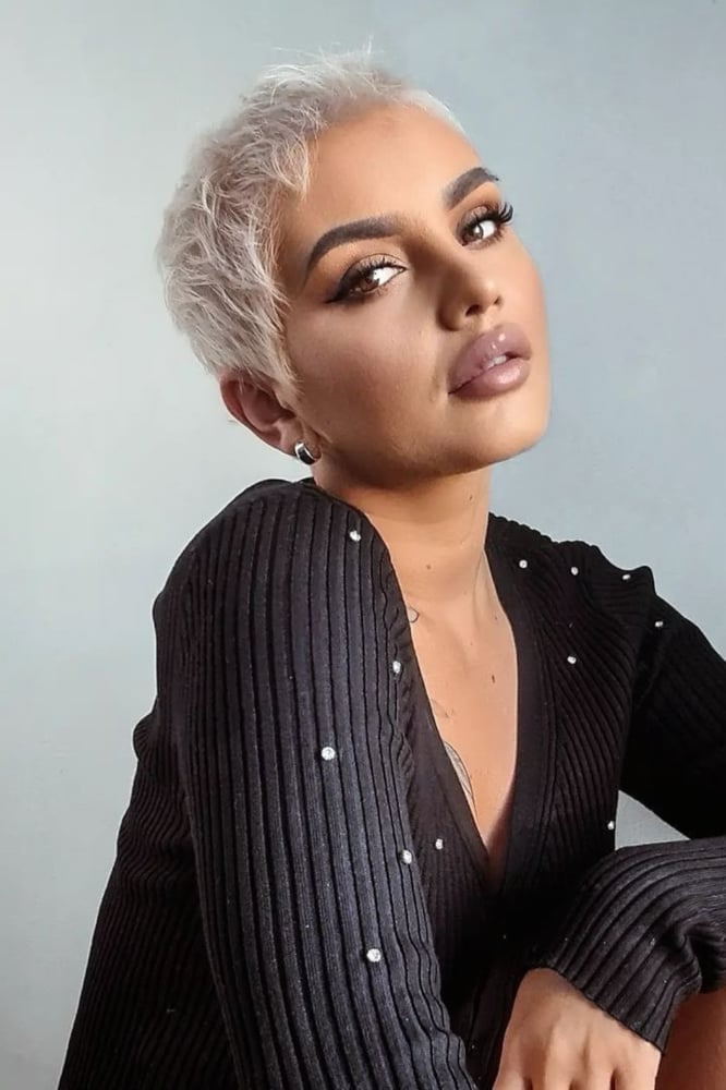 Platinum Blonde Pixie With Textured Bangs — Trendy Very Short Hair