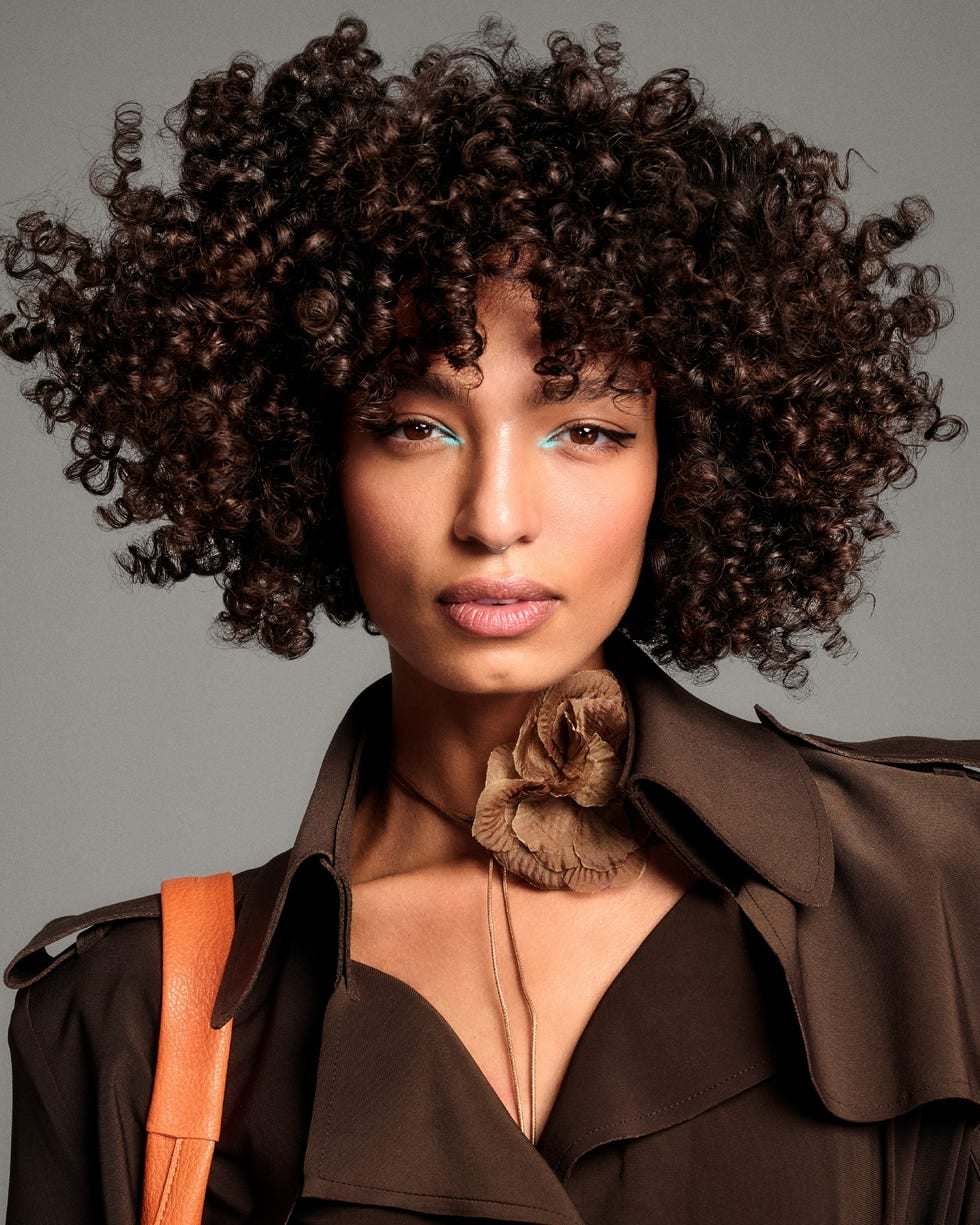 Voluminous Dark Brown Afro — Trendy Very Short Hair