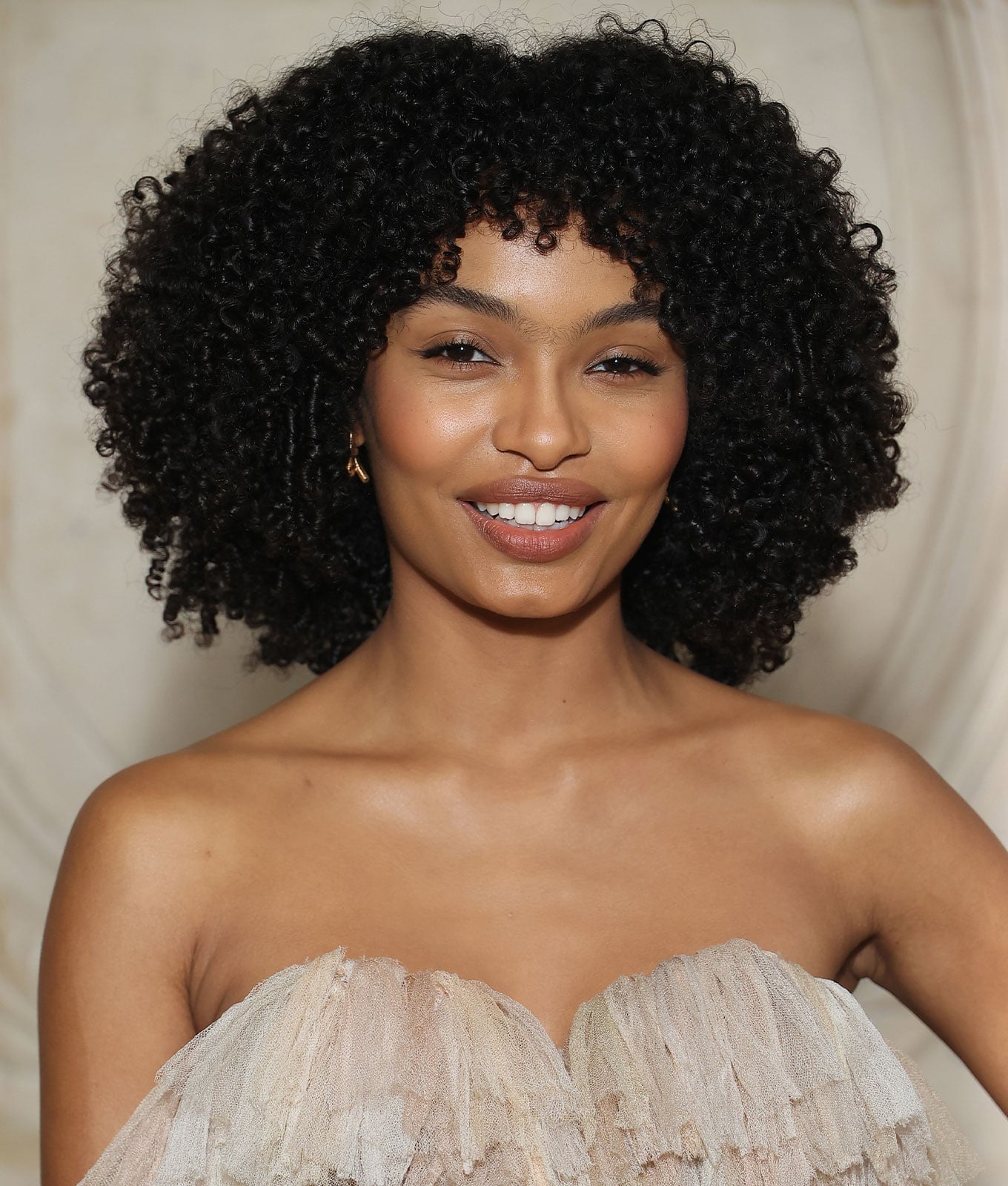 Strapless Gown Features Voluminous Ruffled Neckline Strapless Gown Features Voluminous Ruffled Neckline — Trendy Wash and Go