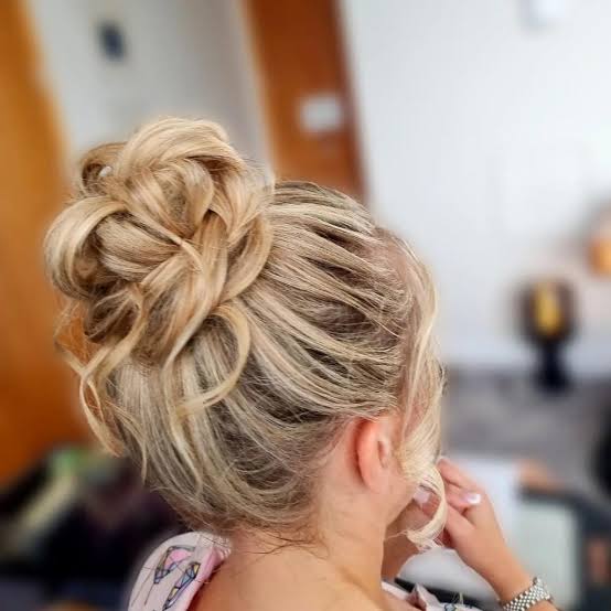 Blonde High Textured Bun Blonde High Textured Bun — Trendy Wedding Guest Updos