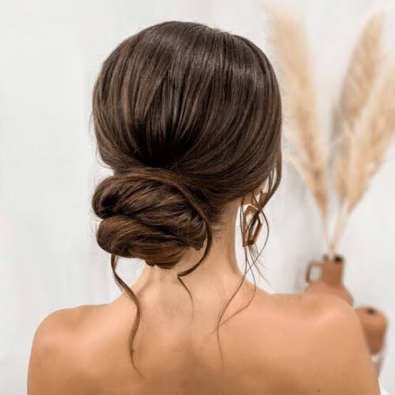 Dark Brown Sleek Low Bun Dark Brown Sleek Low Bun — Trendy Wedding Guest Updos