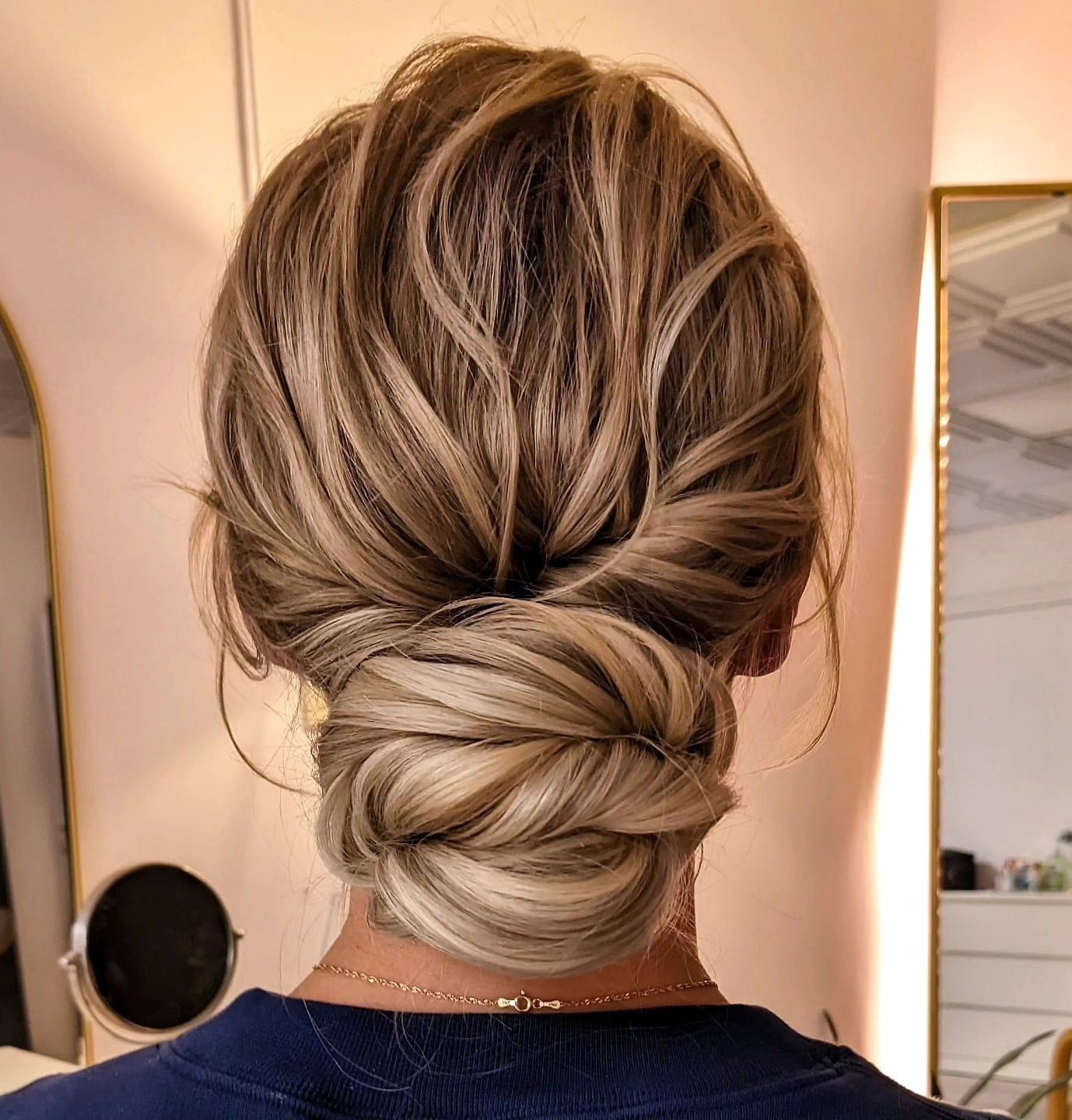 Ash Blonde Thick Wavy Textured Low Bun Ash Blonde Thick Wavy Textured Low Bun — Trendy Wedding Guest Updos