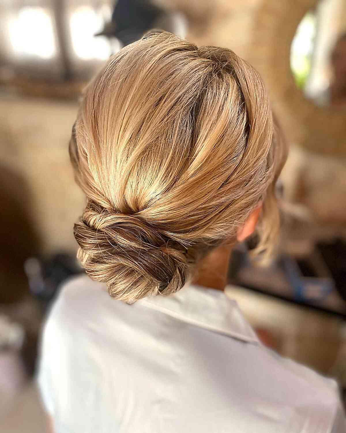 Honey Blonde Low Chignon Bun Honey Blonde Low Chignon Bun — Trendy Wedding Guest Updos