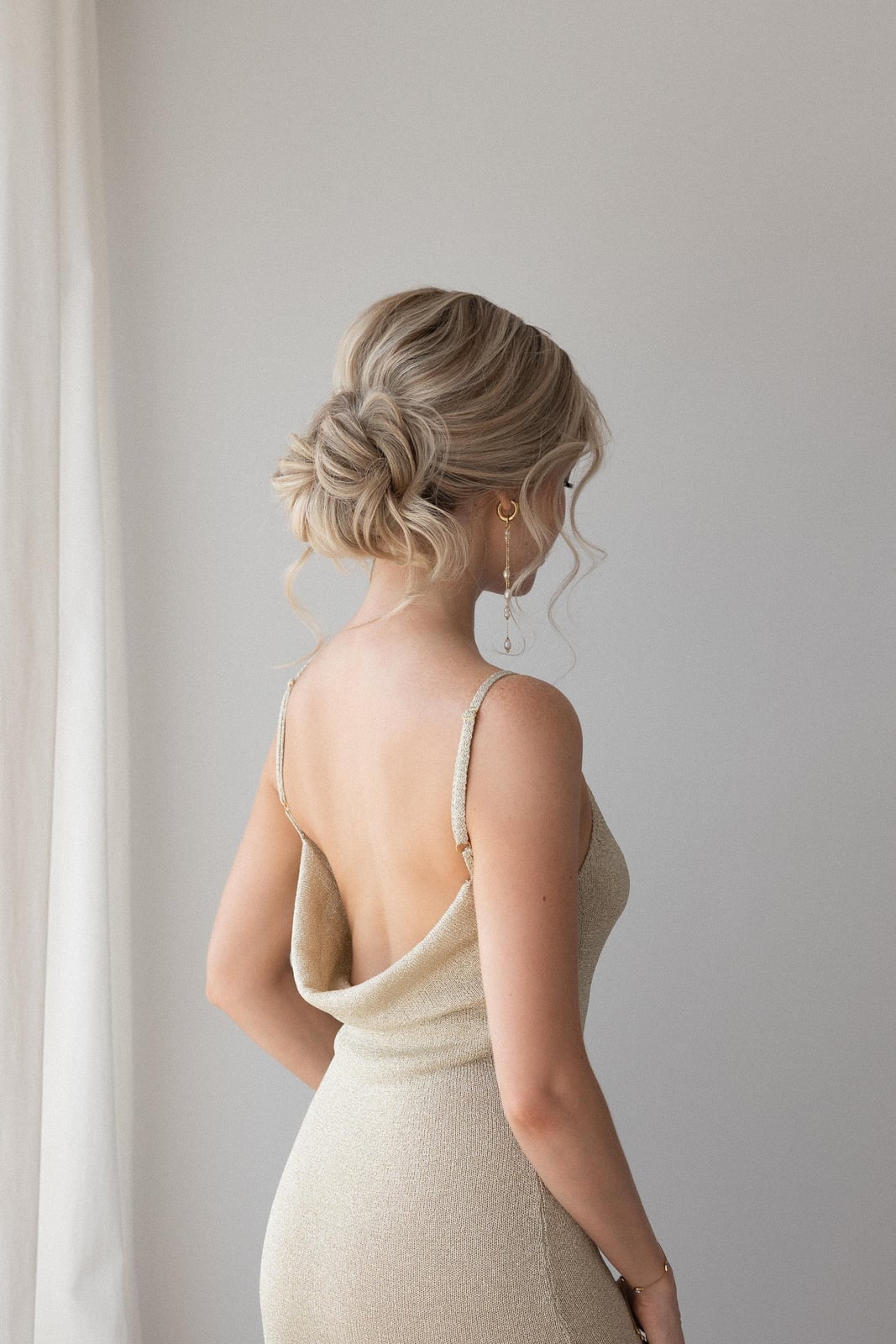 Ash Blonde Sleek Smooth Low Chignon Ash Blonde Sleek Smooth Low Chignon — Trendy Wedding Guest Updos